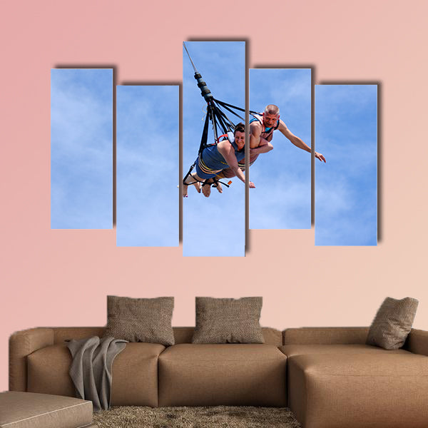 Mature couple rids on SkyCoaster in Wet'n'Wild Gold Coast water park Multi panel canvas wall art