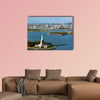 An aerial view from a helicopter of the Statue in New York multi panel canvas wall art