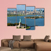 An aerial view from a helicopter of the Statue of Liberty multi panel canvas wall art