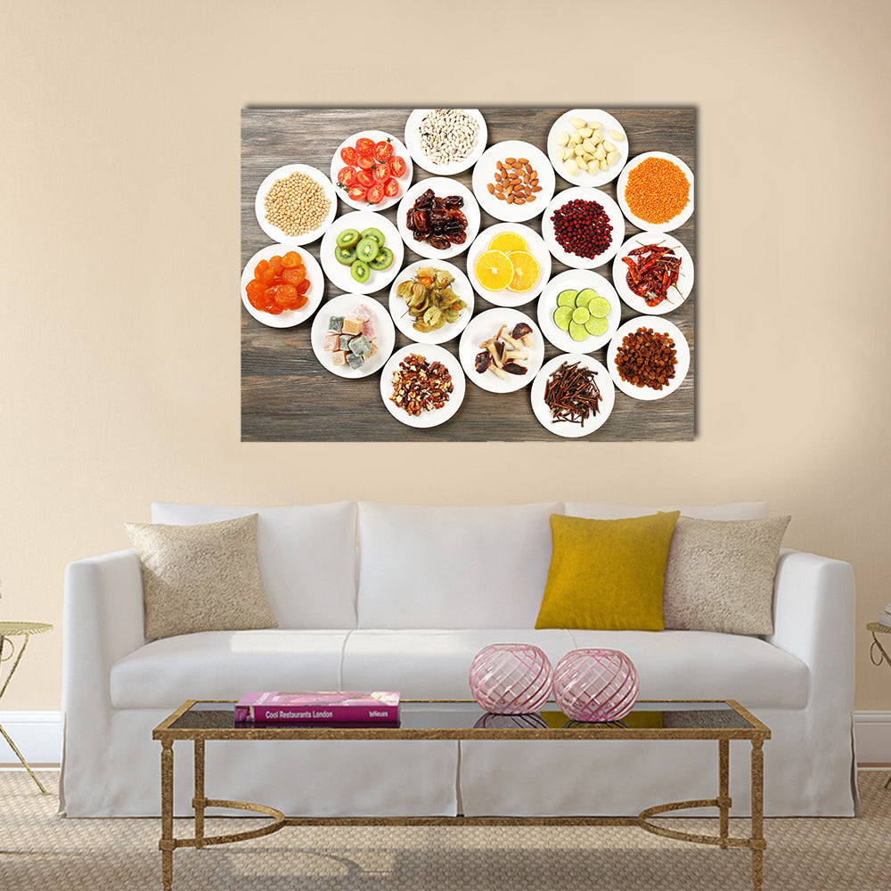 Different products on saucers on wooden table, top view, Multi panel canvas wall art