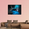 Mystery night at the deep tropical rain forest with flowing cascade waterfall multi panel canvas wall art