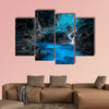 Mystery night at the deep tropical rain forest with flowing cascade waterfall multi panel canvas wall art