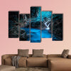 Mystery night at the deep tropical rain forest with flowing cascade waterfall multi panel canvas wall art