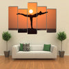 Warrior pose from yoga by woman silhouette on sunset Multi panel canvas wall art