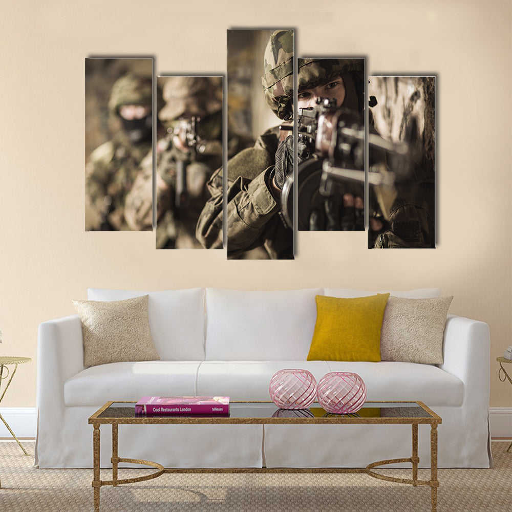 Woman with a rifle in the military Multi Panel Canvas Wall Art