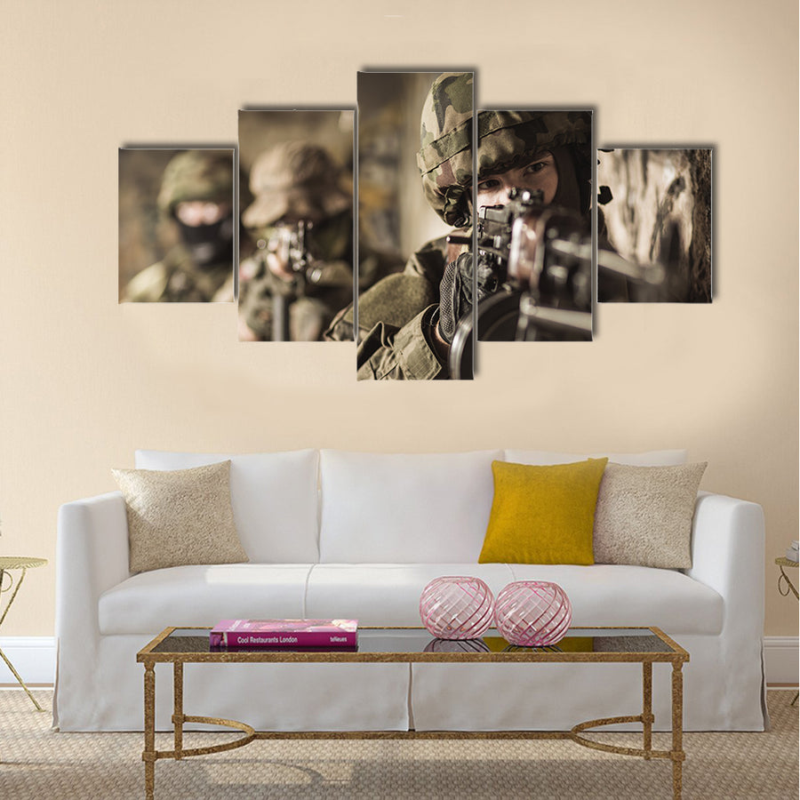Woman with a rifle in the military Multi Panel Canvas Wall Art