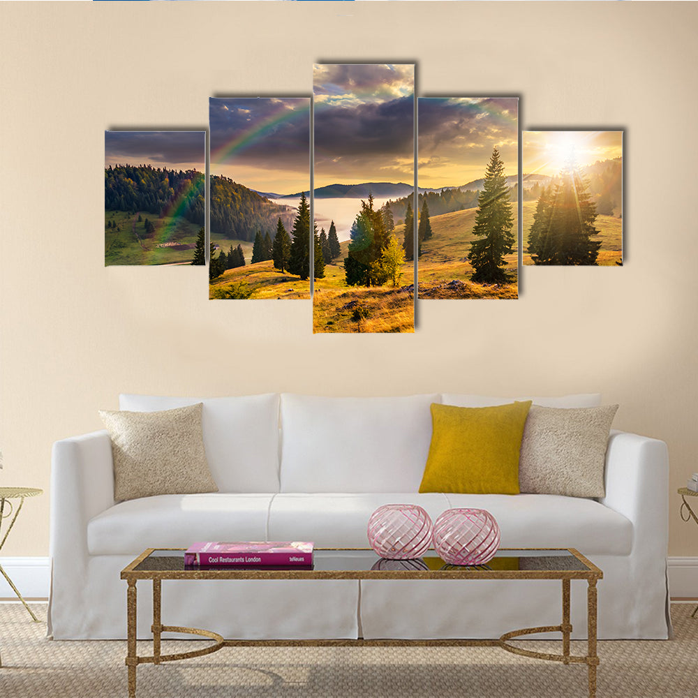 Hillside with coniferous forest among the fog on a meadow multi panel canvas wall art