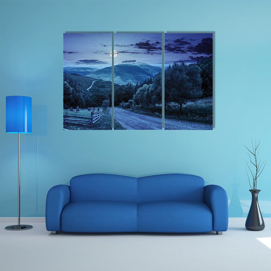 A Composite landscape, A Fence Near Road Going Down The Hill Through Meadow Multi Panel Canvas Wall Art