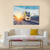 Modern high speed train on a clear day with motion blur Multi panel canvas wall art