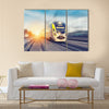 Modern high speed train on a clear day with motion blur Multi panel canvas wall art