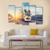 Modern high speed train on a clear day with motion blur Multi panel canvas wall art