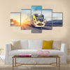 Modern high speed train on a clear day with motion blur Multi panel canvas wall art