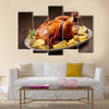 Roasted chicken and vegetables on wooden table Multi panel canvas wall art