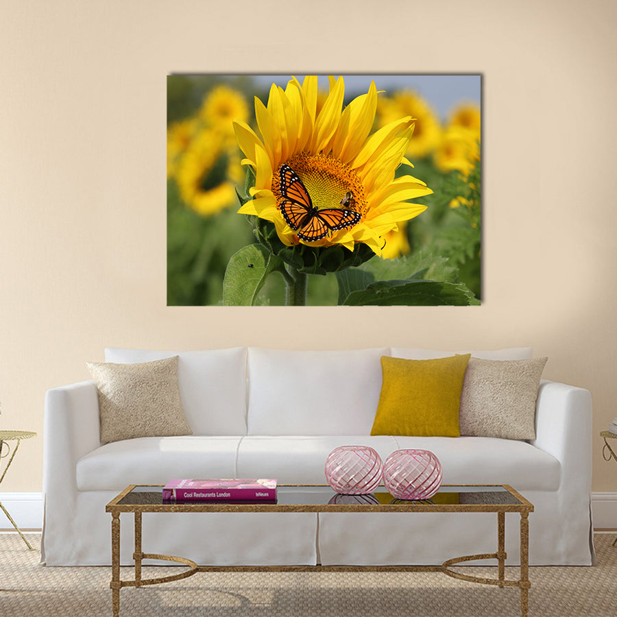 Monarch and a bee on a sunflower Multi Panel Canvas Wall Art
