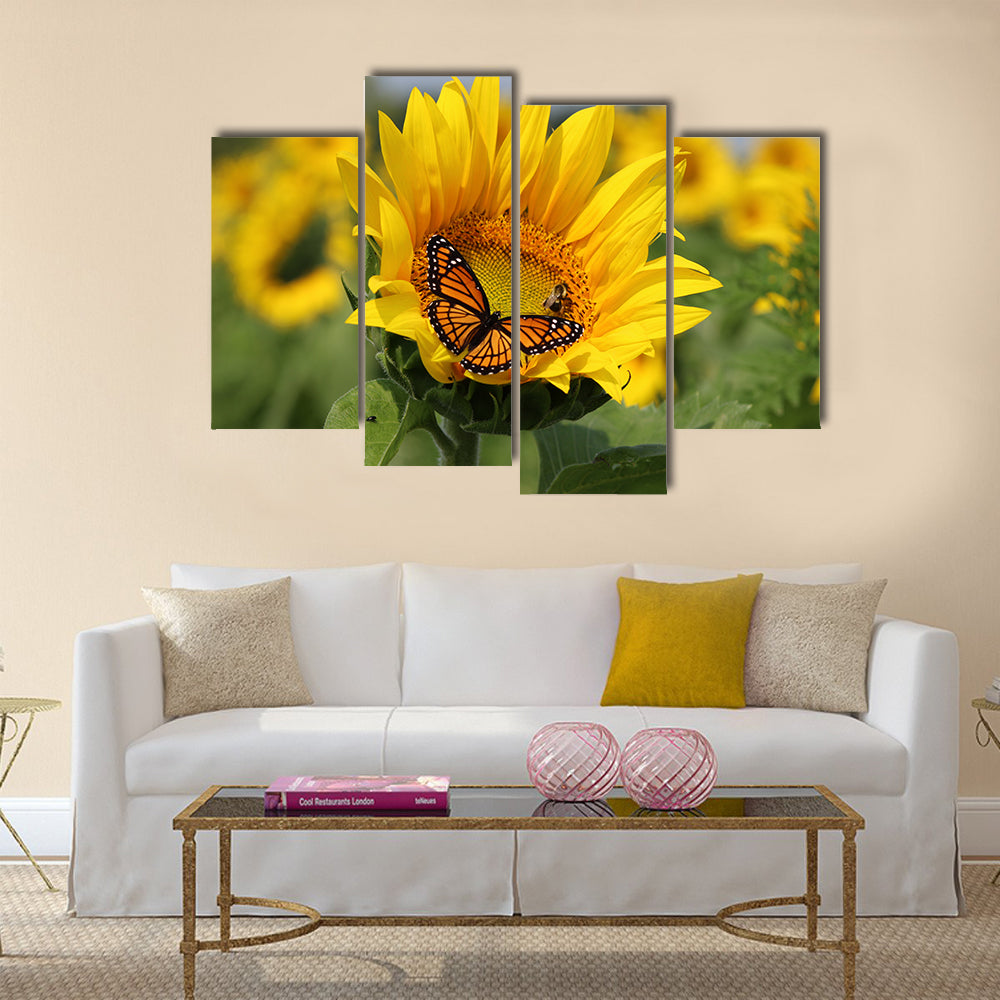 Monarch and a bee on a sunflower Multi Panel Canvas Wall Art
