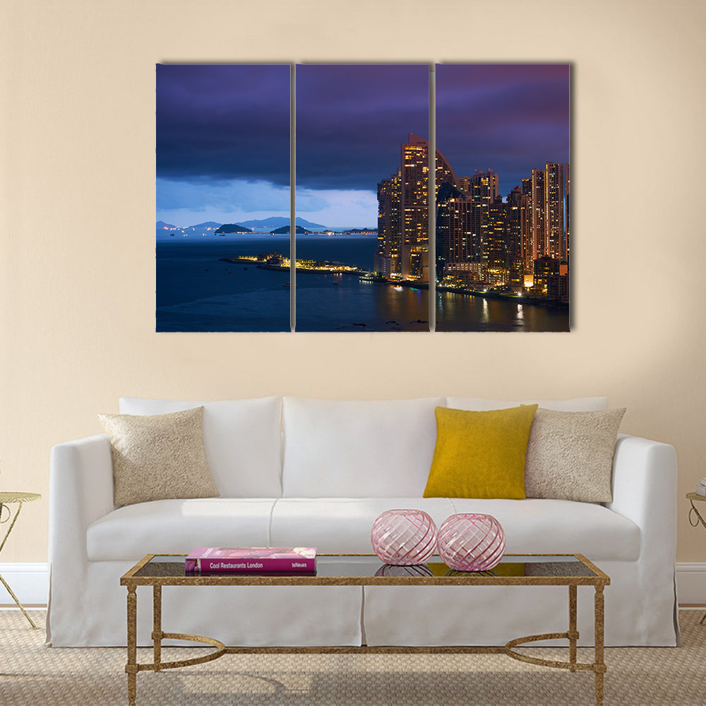 Panama City, enter the Canal and the Trump Tower Skyscraper at sunset Multi panel canvas wall art