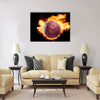 Football ball with the national flag of qatar on fire on a black Multi panel canvas wall art