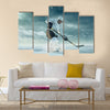 Ice hockey player in outdoor mountains Multi panel canvas wall art