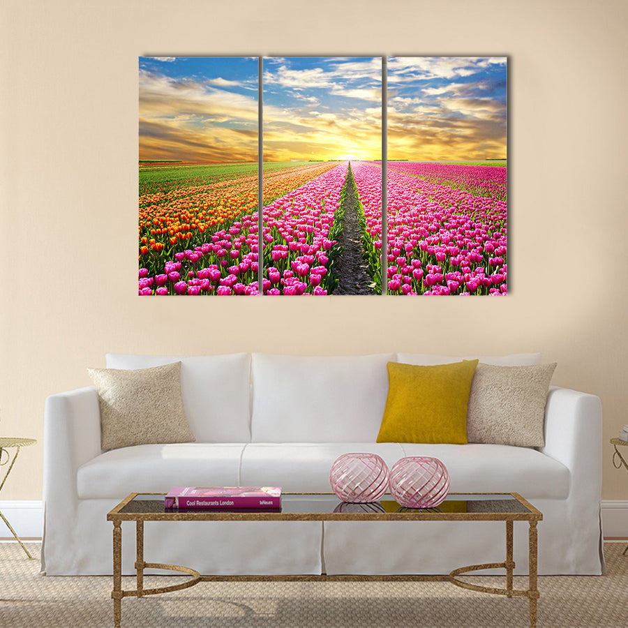 A magical landscape with sunrise over tulip field Multi Panel Canvas Wall Art