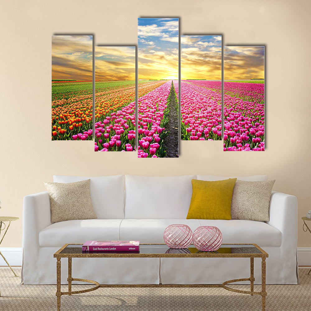 A magical landscape with sunrise over tulip field Multi Panel Canvas Wall Art