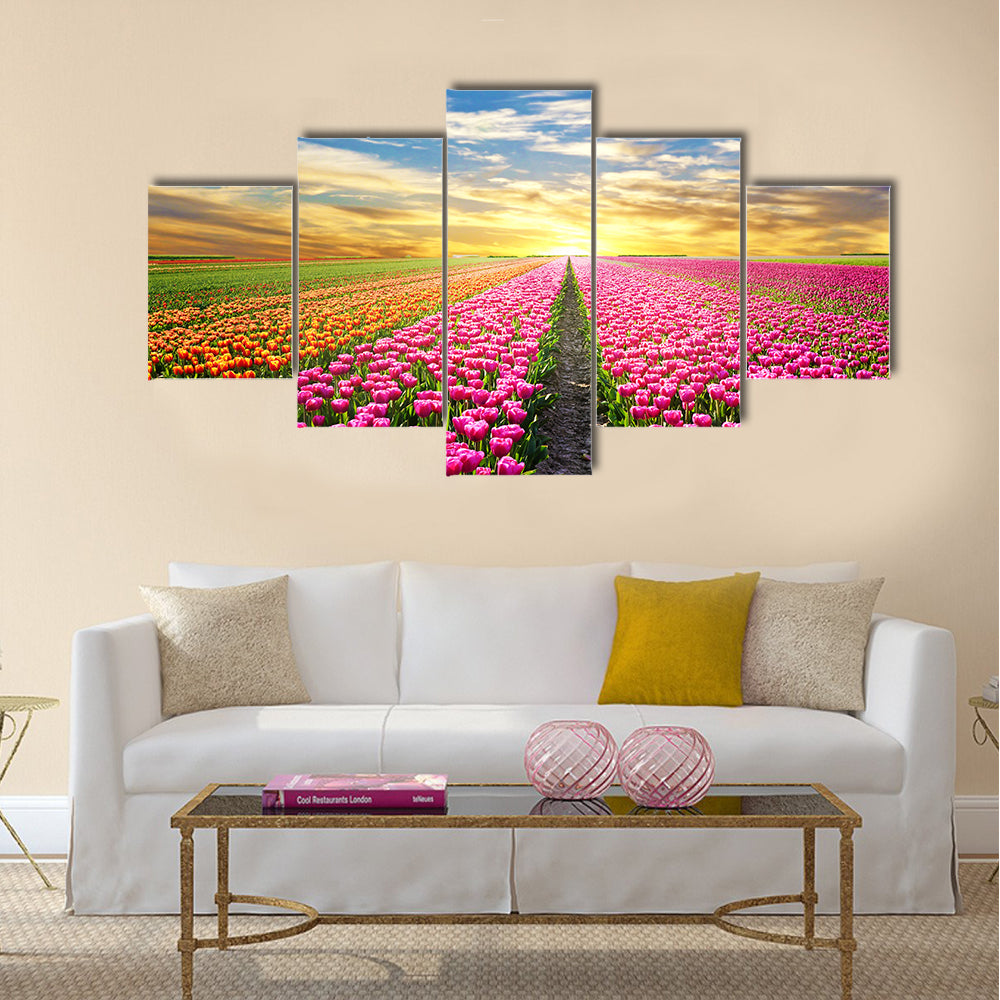 A magical landscape with sunrise over tulip field Multi Panel Canvas Wall Art