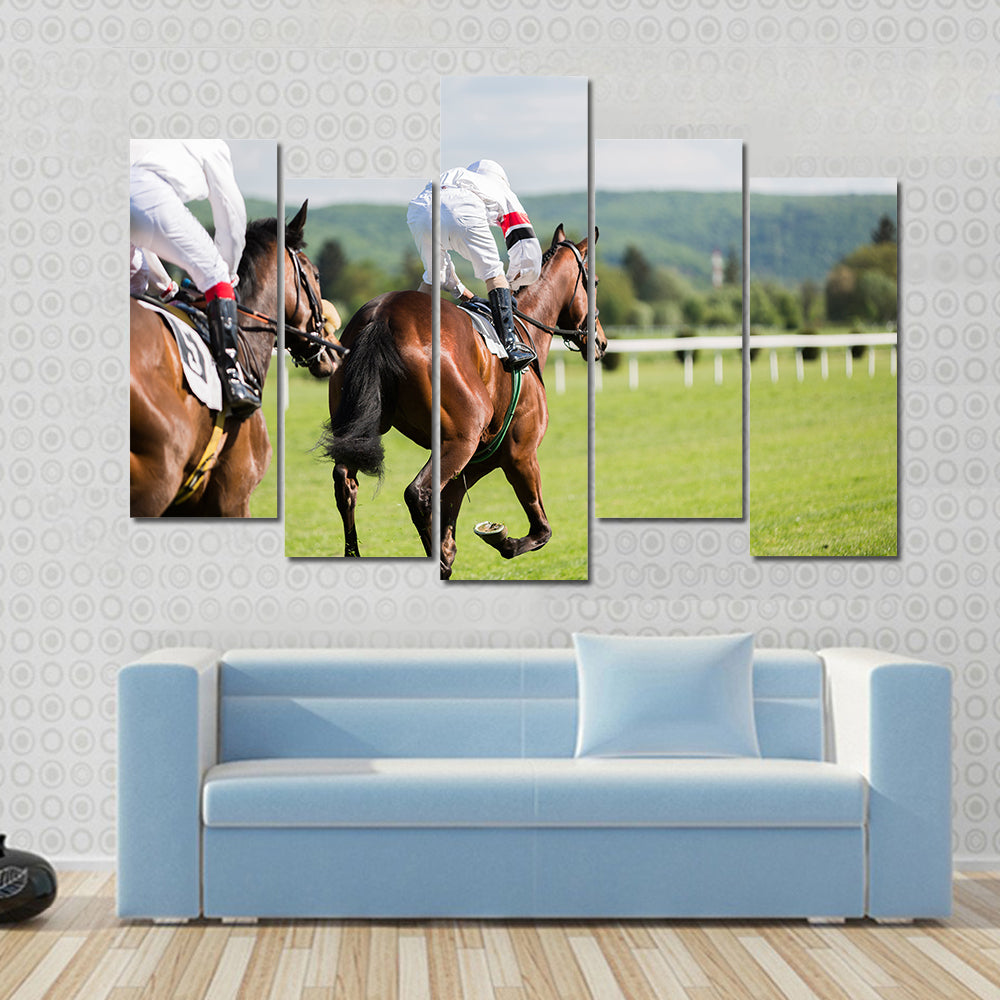 Two riders on the racing circuit competition Multi panel canvas wall art