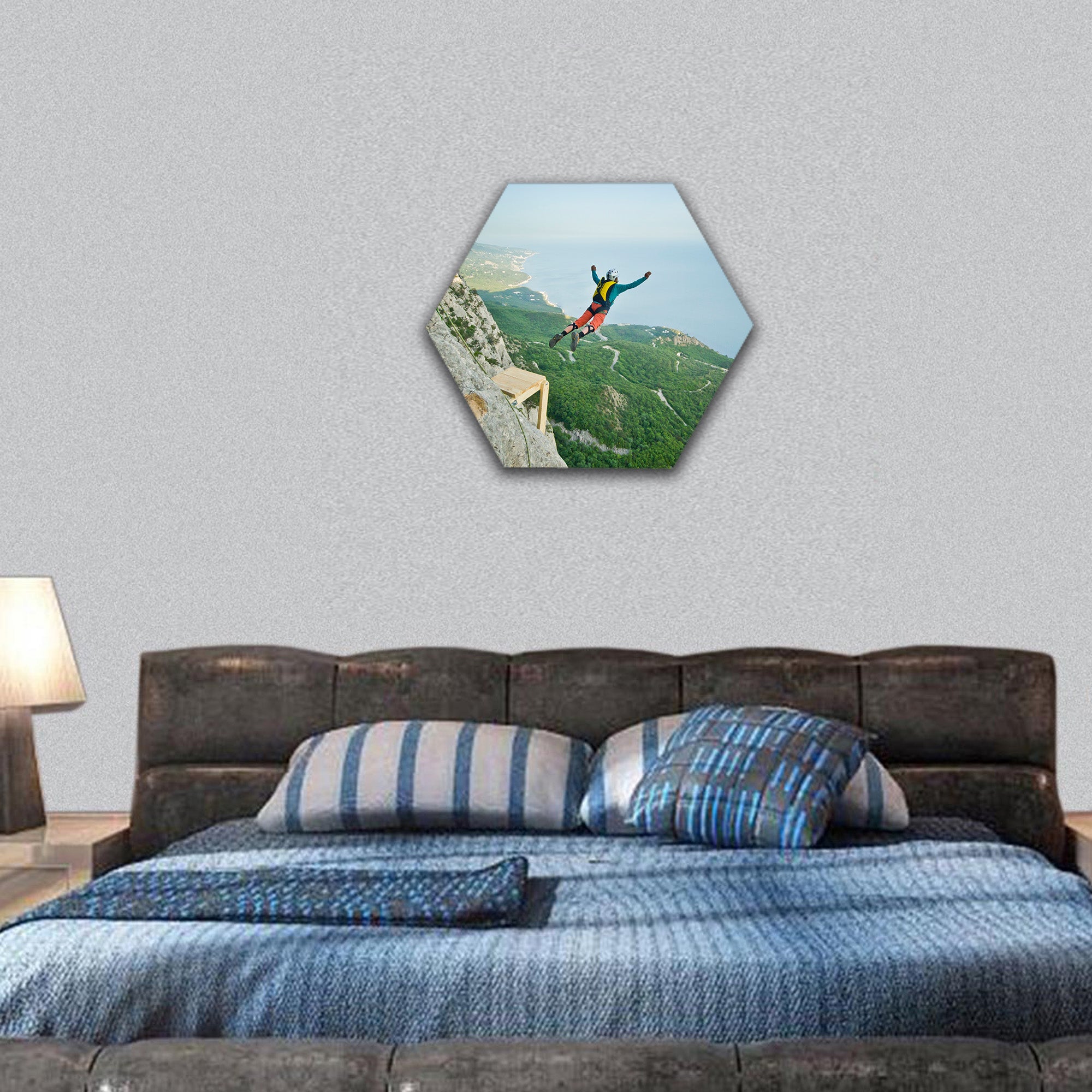 base-jumper prepare to jump from the cliff in mountains hexagonal canvas wall art