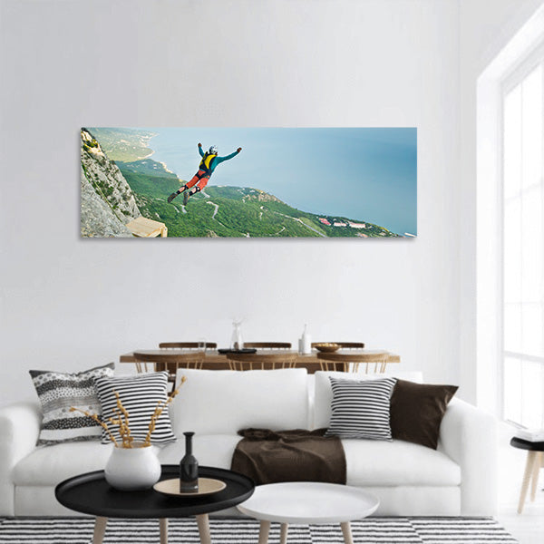 Base-jumper from the cliff panoramic canvas wall art