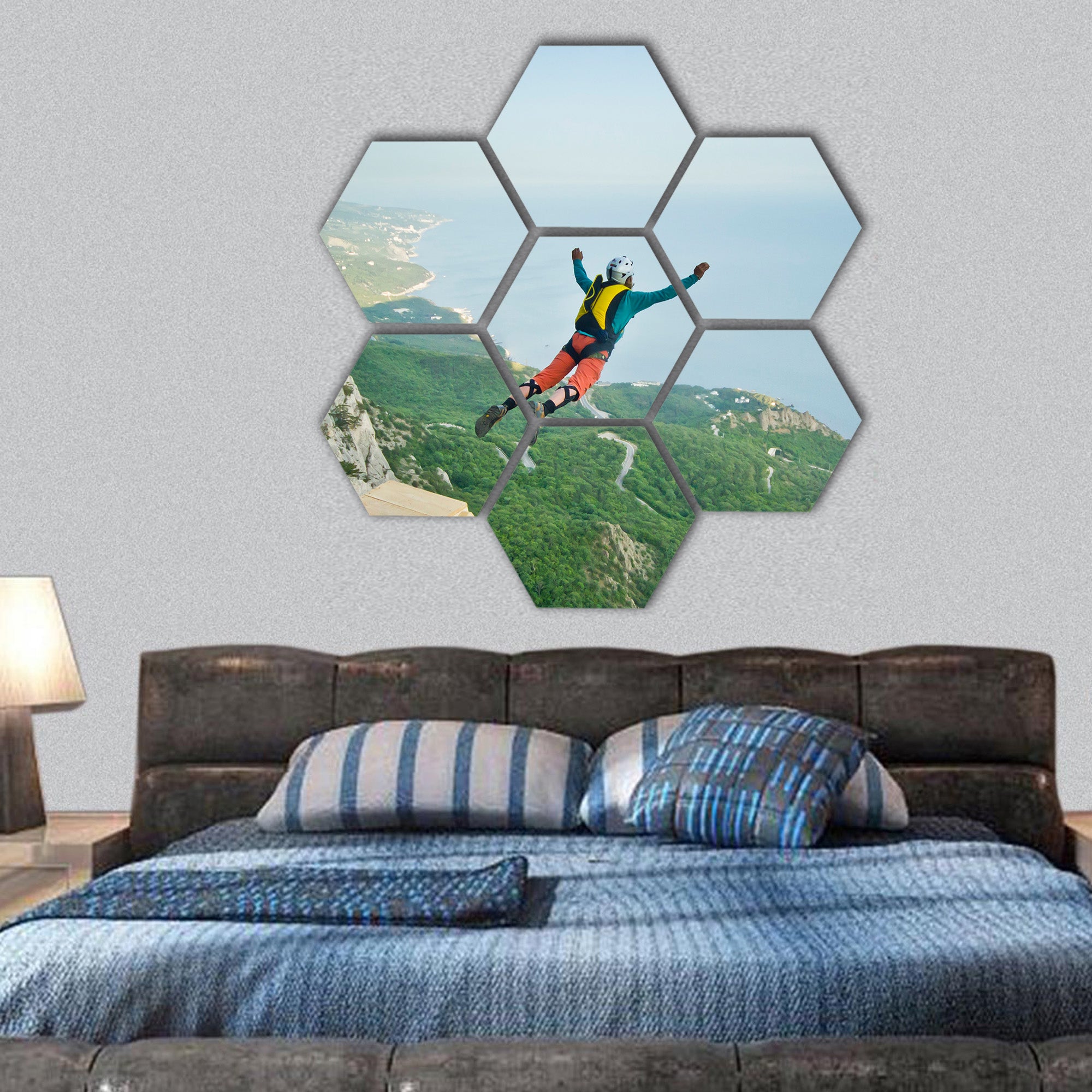 base-jumper prepare to jump from the cliff in mountains hexagonal canvas wall art