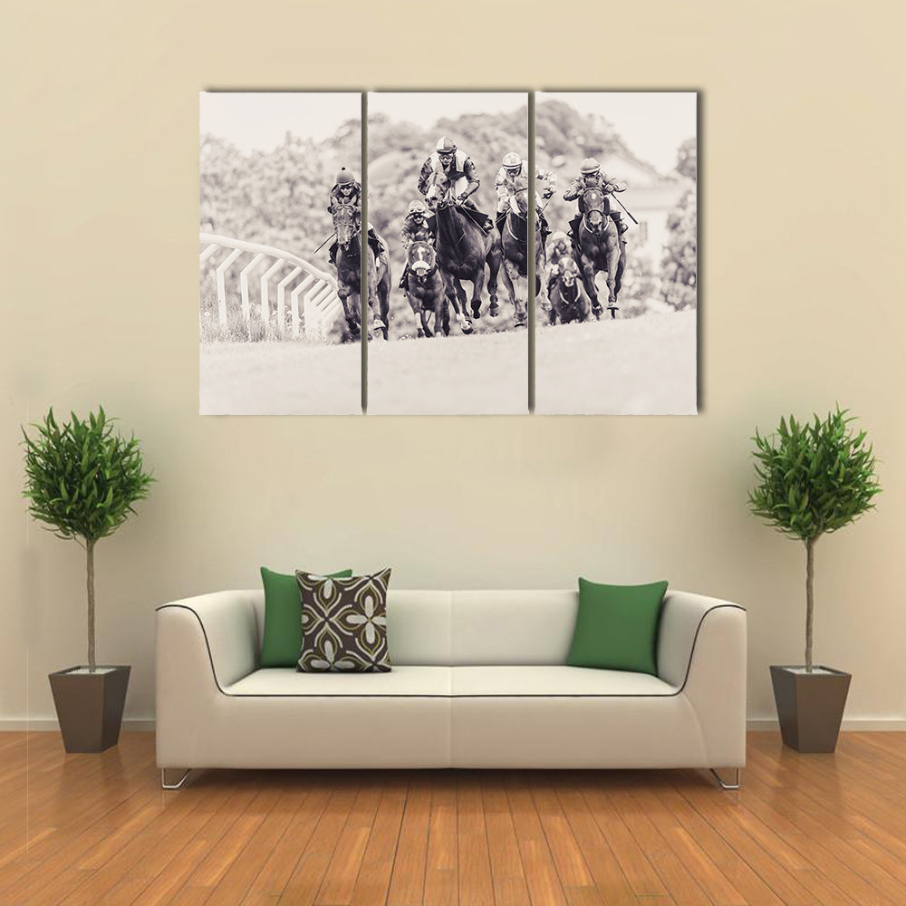 Horses with jockeys out of a curve in fast pace at National dagsgaloppen at Gardet multi panel canvas wall art