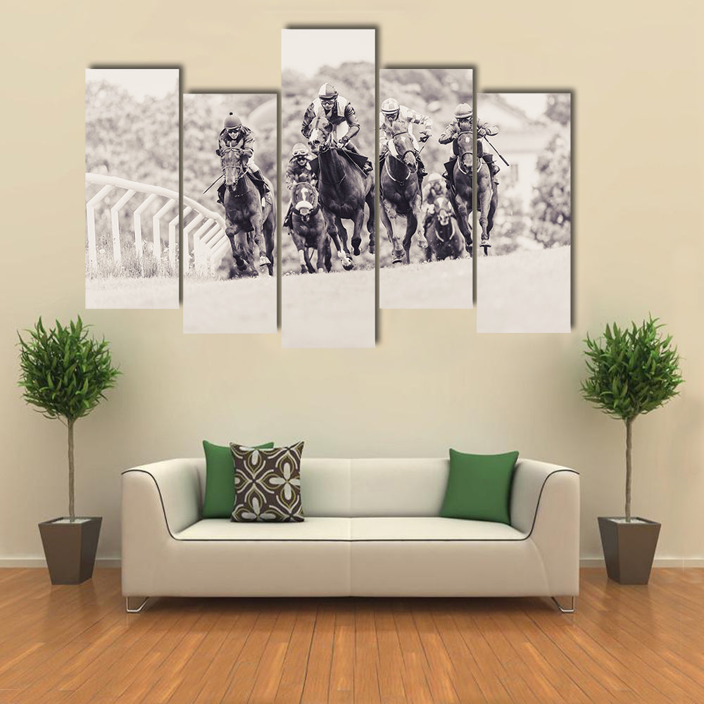 Horses with jockeys out of a curve in fast pace at National dagsgaloppen at Gardet multi panel canvas wall art