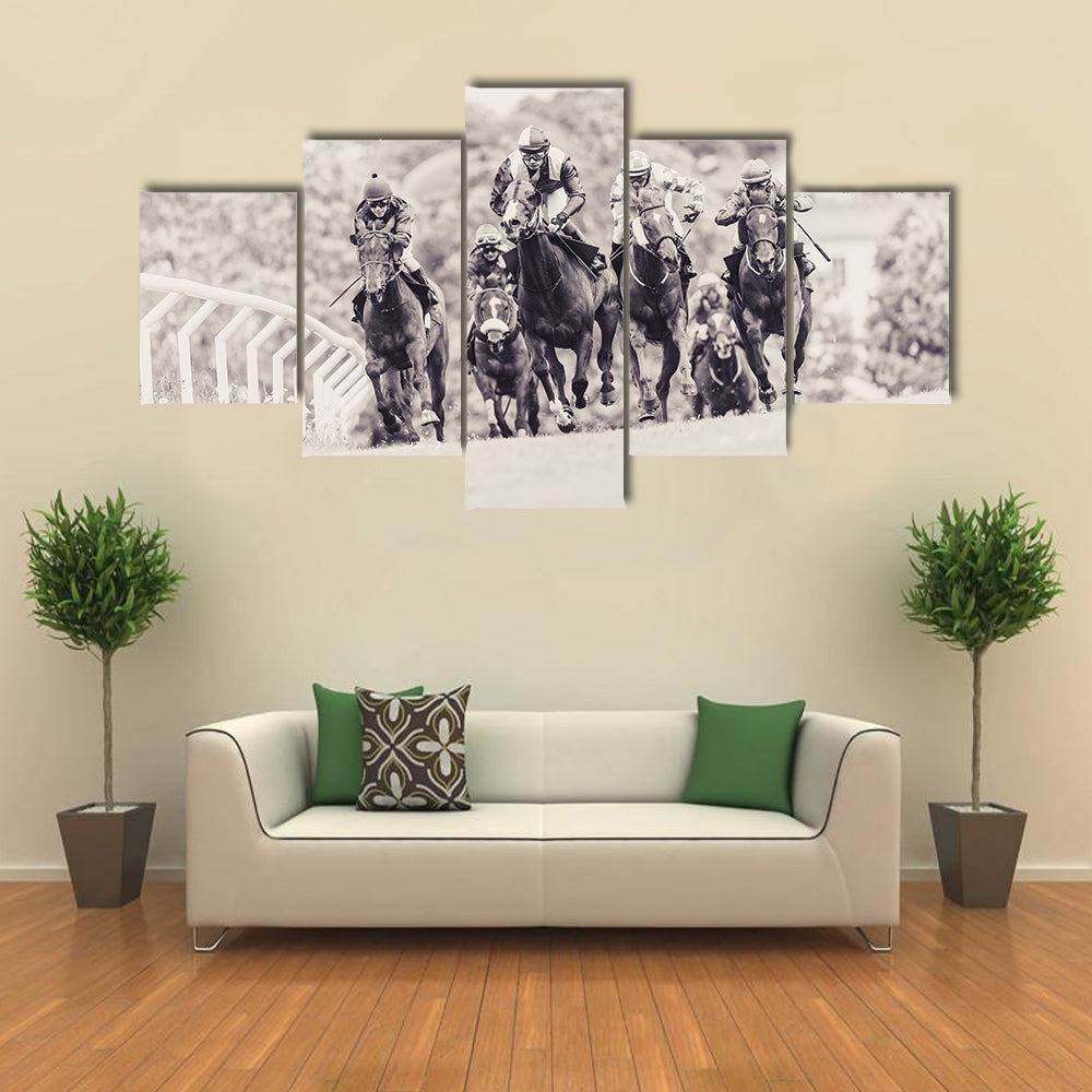 Horses with jockeys out of a curve in fast pace at National dagsgaloppen at Gardet multi panel canvas wall art