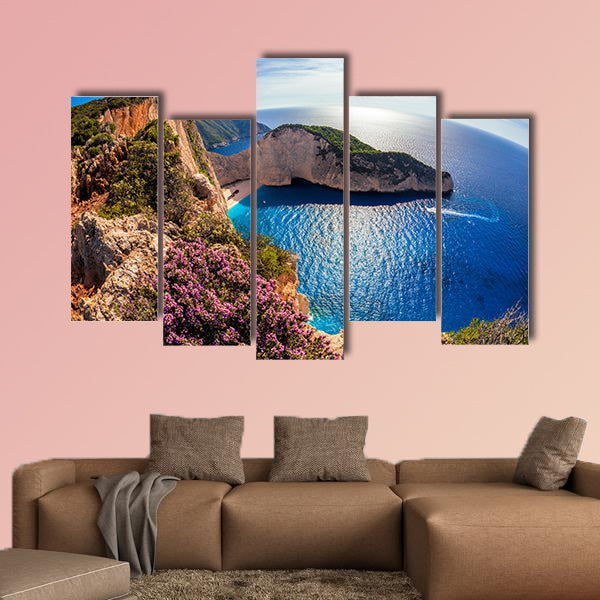 Navagio beach with shipwreck and flowers against sunset, Zakynthos Island, Greece multi panel canvas wall art