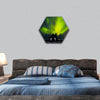 Northern light over church, village in Iceland, hexagonal canvas wall art