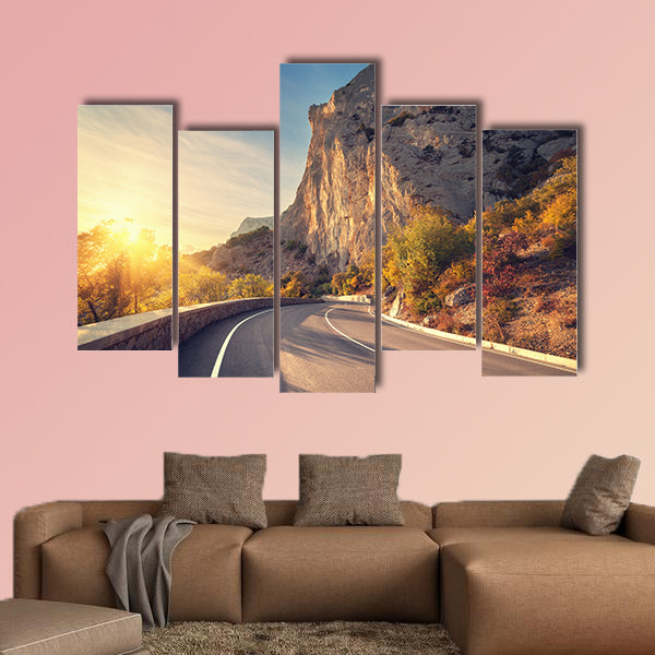 Asphalt road in autumn forest at sunrise multi panel canvas wall art