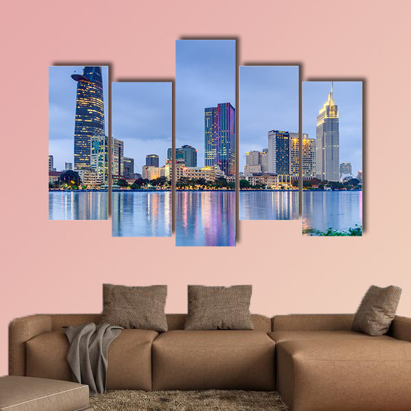 Lights of Saigon downtown skyline are reflected in the river wall art