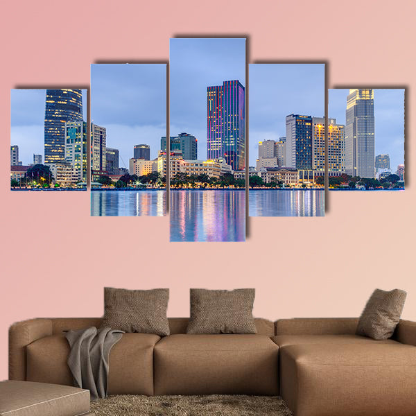 Lights of Saigon downtown skyline are reflected in the river wall art
