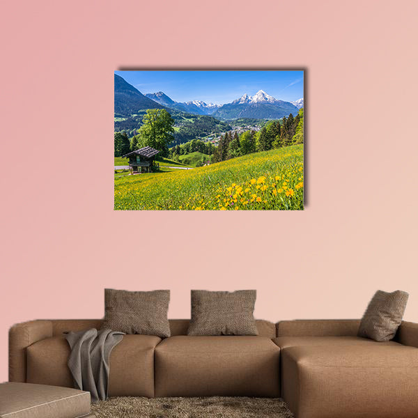 Panoramic view of idyllic landscape in the Alps with a traditional wall art