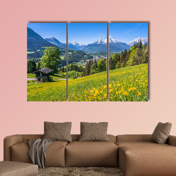 Panoramic view of idyllic landscape in the Alps with a traditional wall art