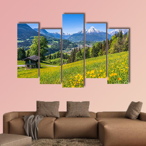 Panoramic view of idyllic landscape in the Alps with a traditional wall art