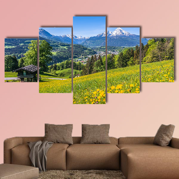 Panoramic view of idyllic landscape in the Alps with a traditional wall art