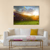 Evening stadium arena soccer field championship win. Confetti and tinsel . Yellow toning Multi Panel Canvas Art