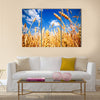 Wheat field and blue sky with clouds Multi panel canvas wall art