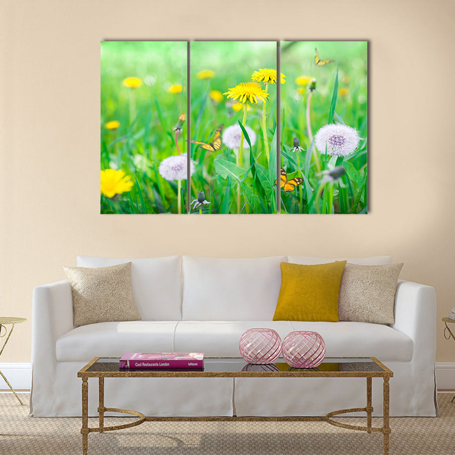 Air dandelions on a green field. Spring background Multi Panel Canvas Wall Art