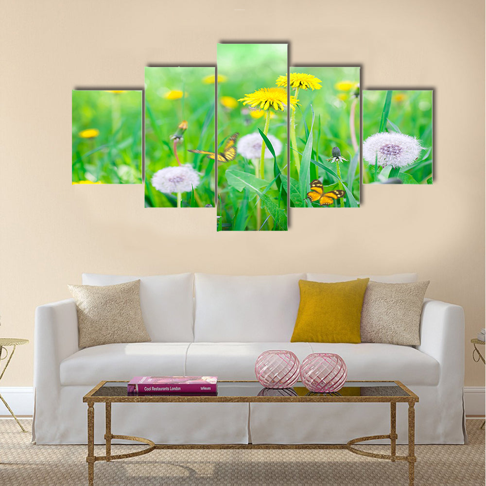Air dandelions on a green field. Spring background Multi Panel Canvas Wall Art