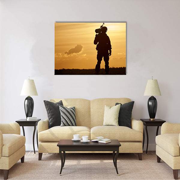 soldier silhouette in uniform with machine gun or assault rifle sunset board multi panel canvas wall art