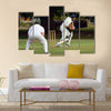 Cricket batsman try to blocks the ball Cricket is played Multi panel canvas Wall art