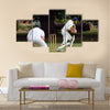 Cricket batsman try to blocks the ball Cricket is played Multi panel canvas Wall art