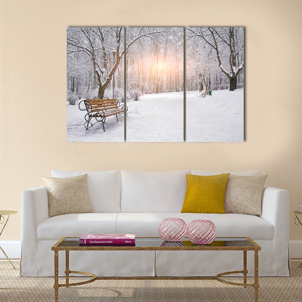 Snow-covered trees and benches  Multi panel canvas wall art