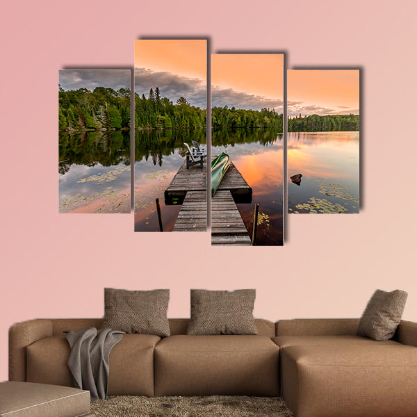 Green Canoe and Chairs on a Dock Next to a Lake at Sunset wall art